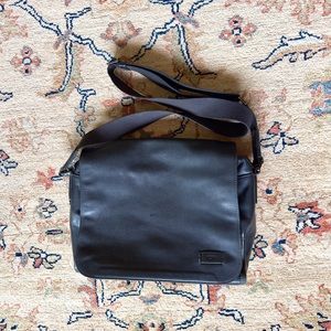 Tumi leather black messenger bag